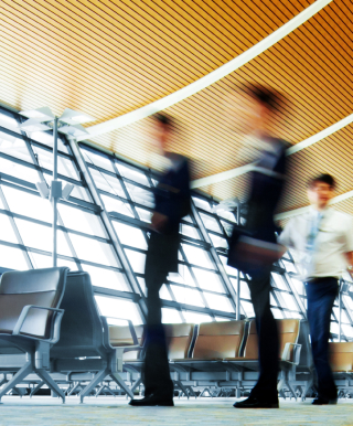 Blurred people walking in airport