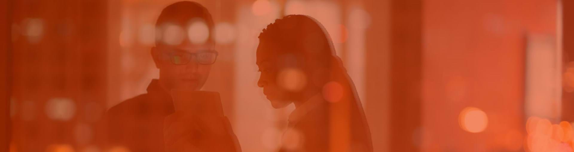 Business people looking at tablet