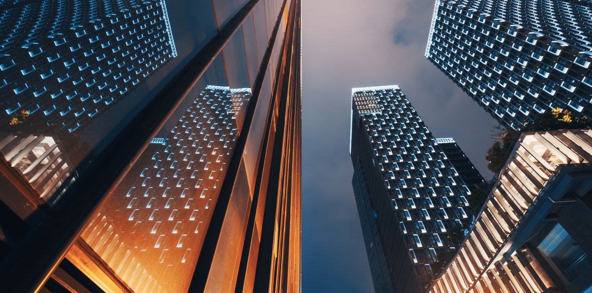 Modern skyscrapers illuminated at night