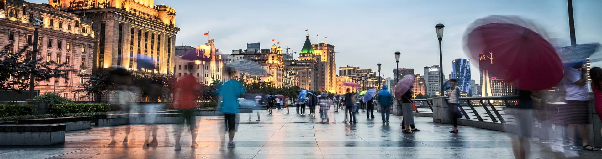 Blurred image of people walking in the street